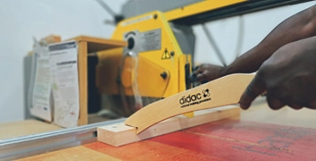 Woodworking machine training course with operator at machinery